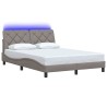 Cadre de lit avec LED sans matelas taupe 140x200 cm tissu 