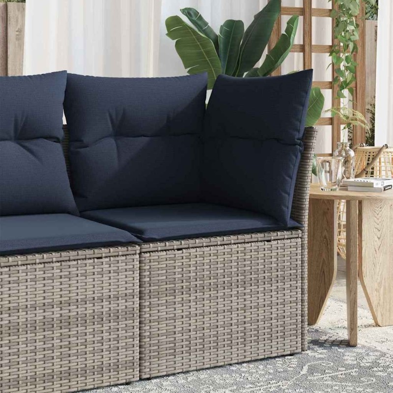 Canapé d'angle de jardin avec des coussins gris en poly rotin 