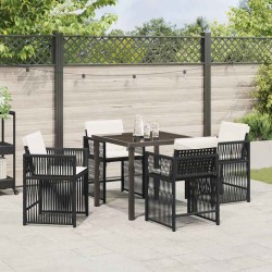 Ensemble de jardin 5 pièces avec des coussins noirs en poly rattan. 