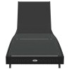 Chaise longue noire en poly rotin et textilène 